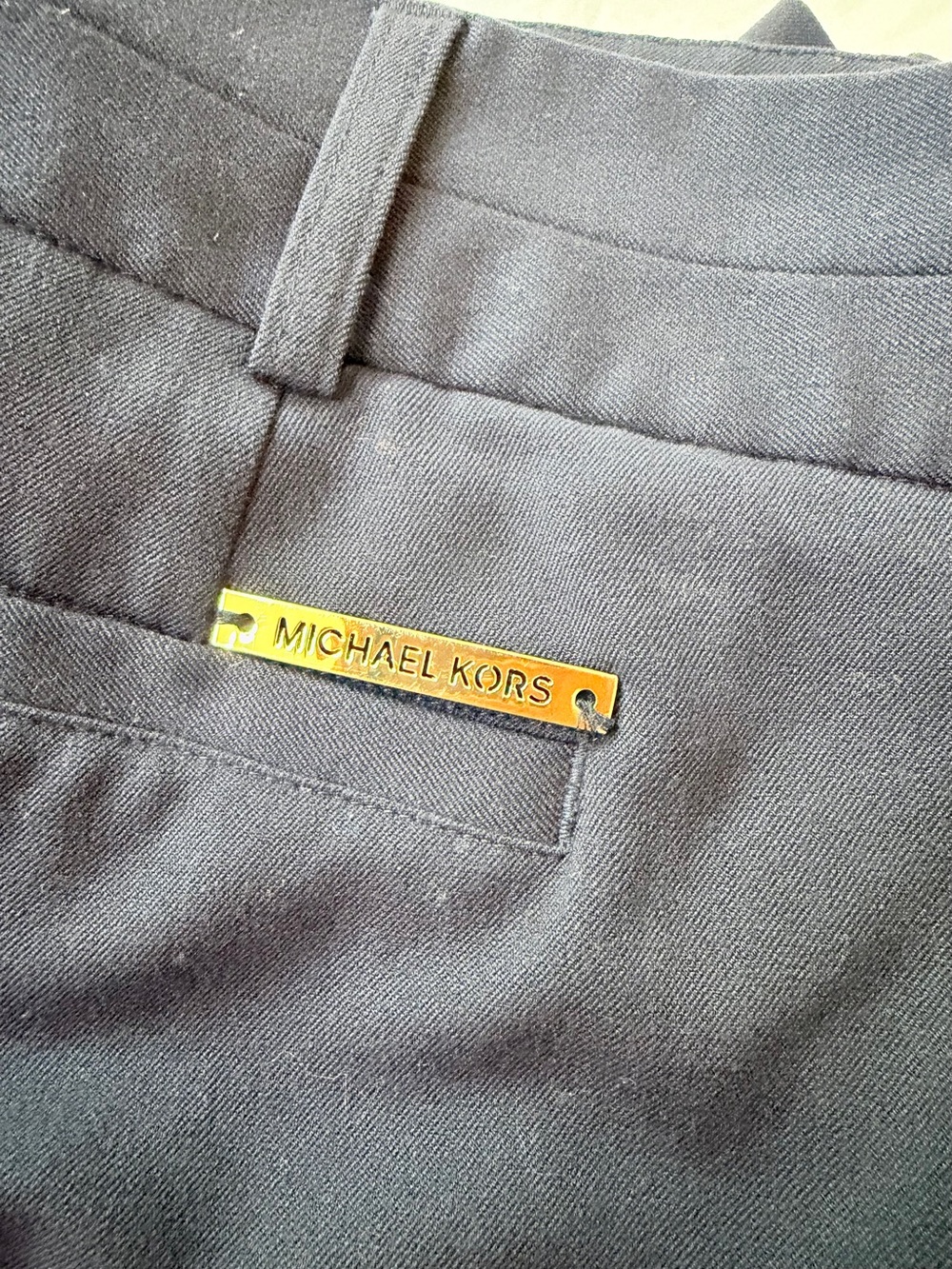 Michael Kors women’s Navy Blue Dress Pants with Gold Logo Plaque